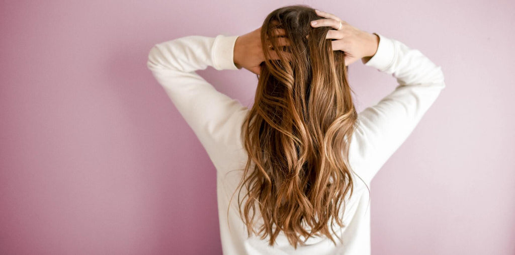 A woman with beautiful hair after taking collagen