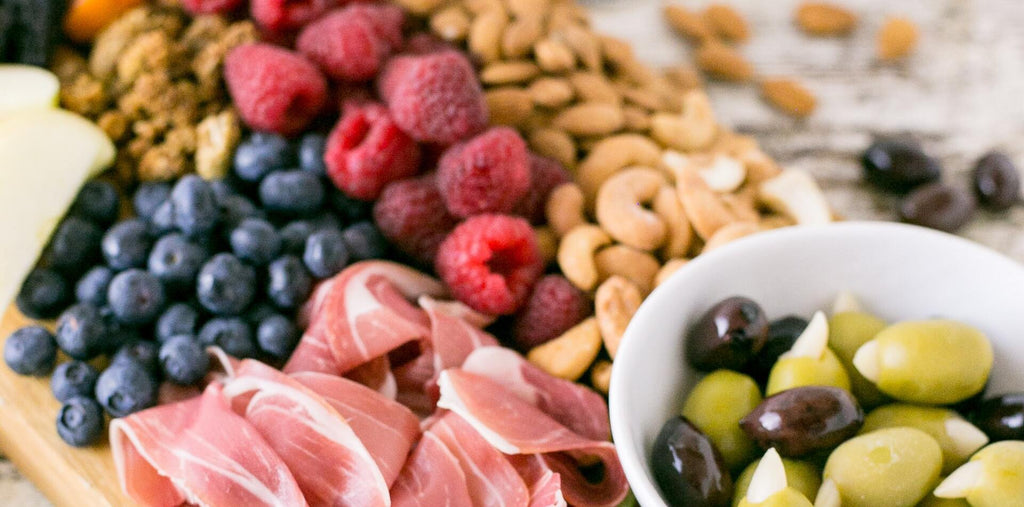 Berries, nuts, and prosciutto as perfect morning snacks