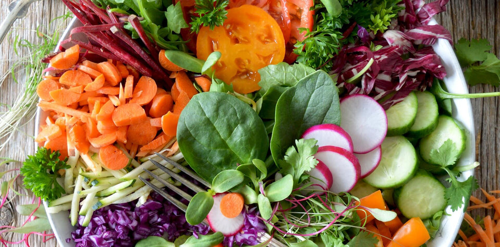 fresh vegatables and greens on the table