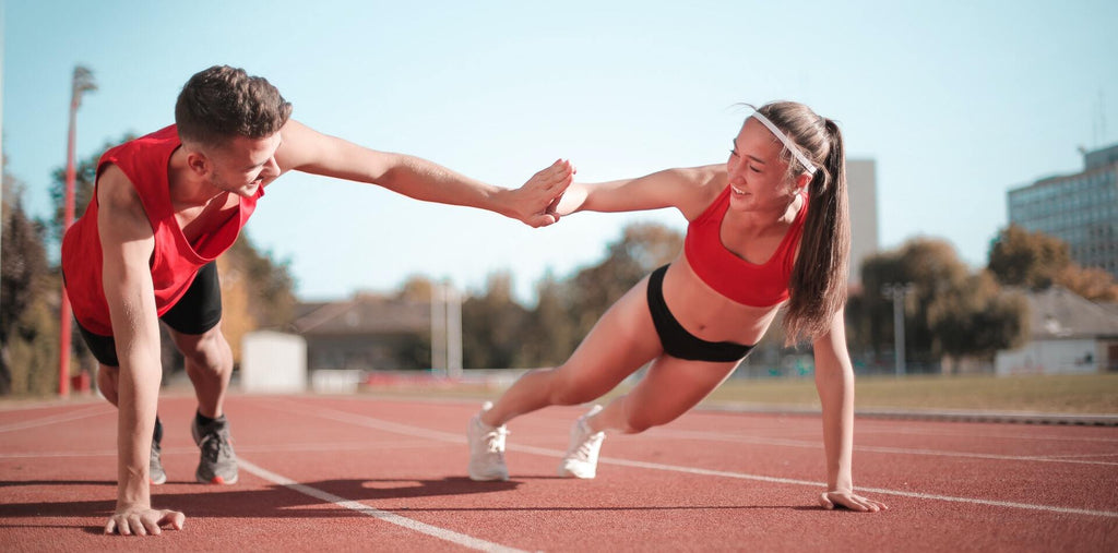 A man and a woman are happy and exercising