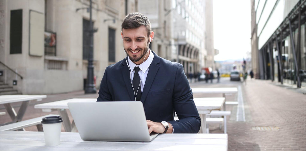 A happy man working outside