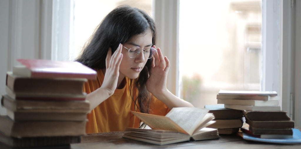 Woman experiencing high stress levels because she lacks sleep