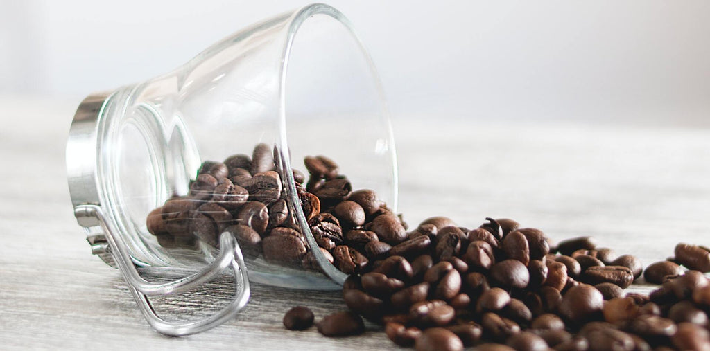 coffee seeds and a cup on the table