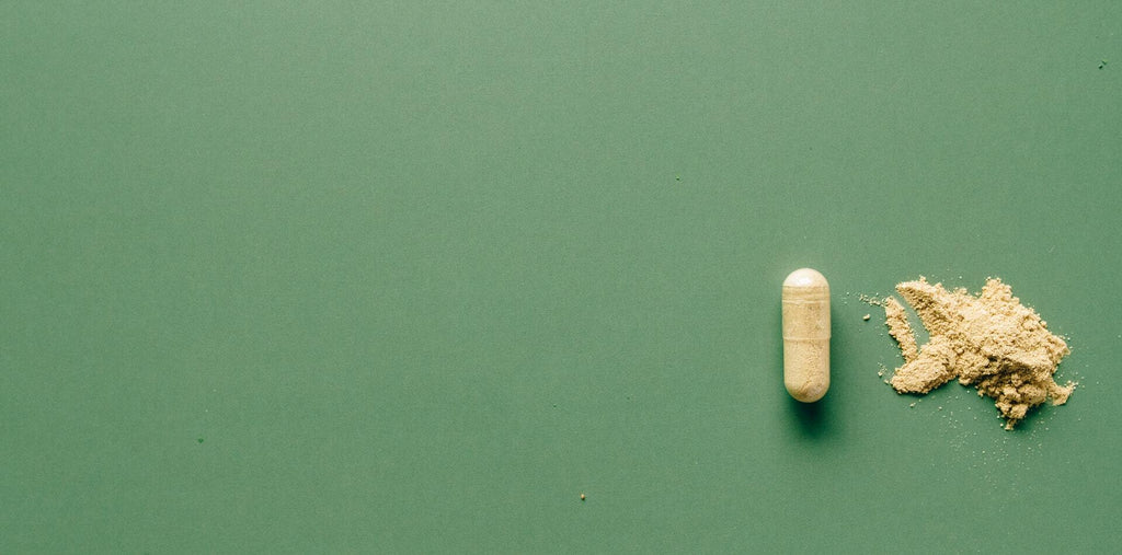 A capsule on a green background