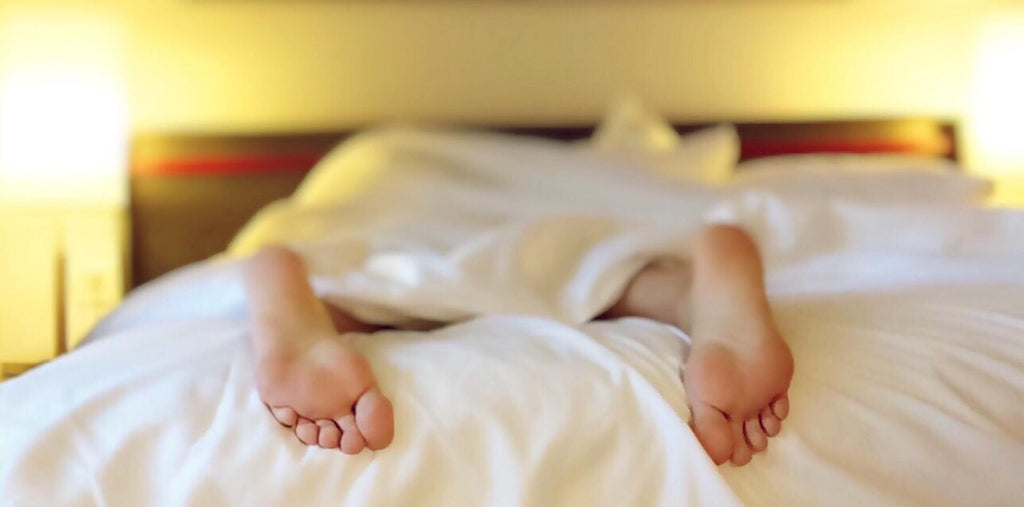  feet of a girl that lays on the bed