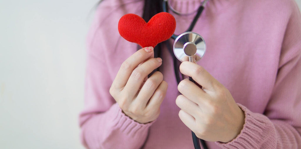 A women with a plush heart