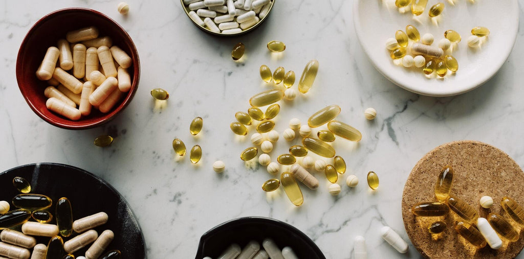 Different types of Omega-3 supplements in cups