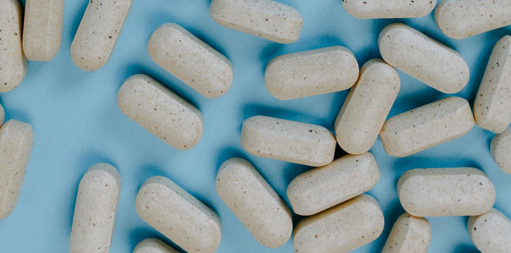 Pills on blue background