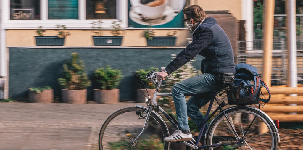 A man riding a bicycle to boost his stamina and energy