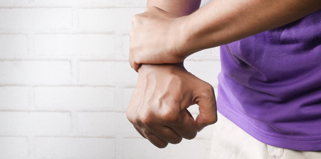 A person holding a hand with stong bones