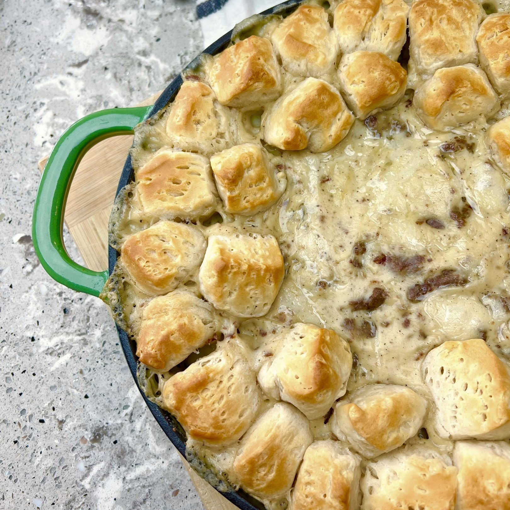 Biscuits and Gravy in a green Skillet
