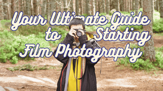 Person holding 35mm film camera