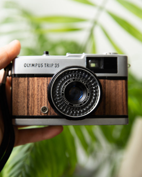 Wood covered Olympus Trip 35mm film camera for beginners