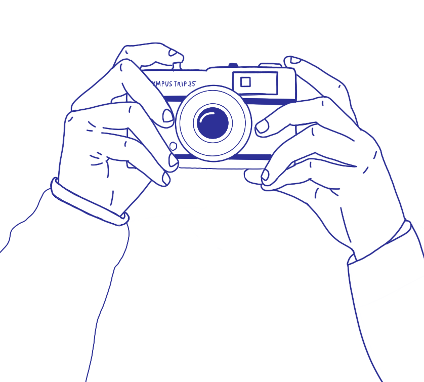 Illustration of person holding Olympus Trip camera