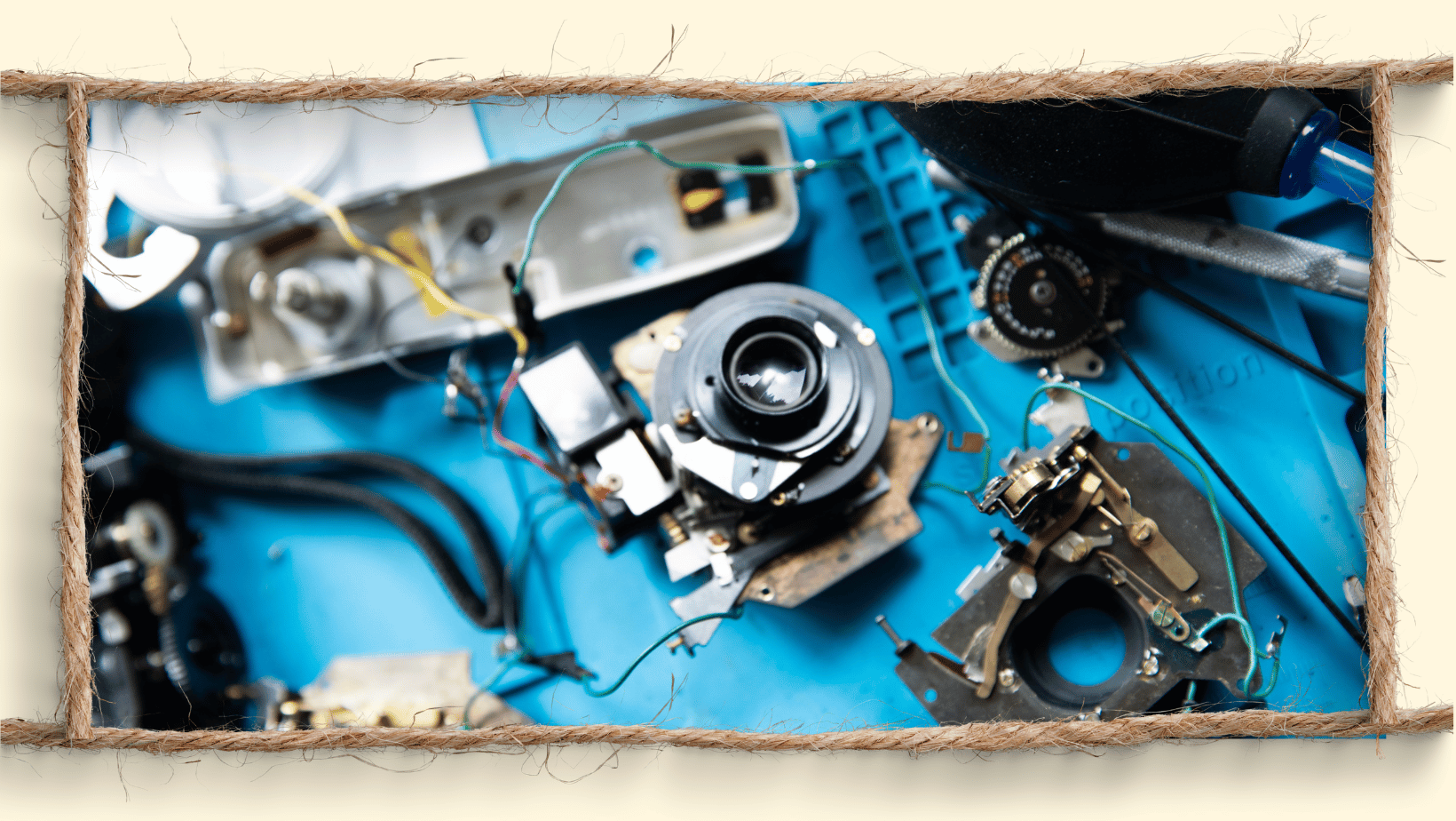 Olympus Trip 35 35mm film camera being disassembled and repaired