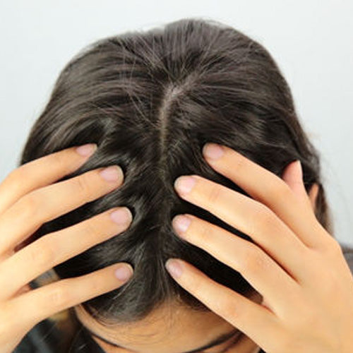 Massage gently on your scalp until it gets absorbed