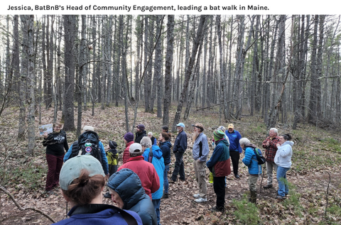 Group gathered in a wooded area to learn about bats