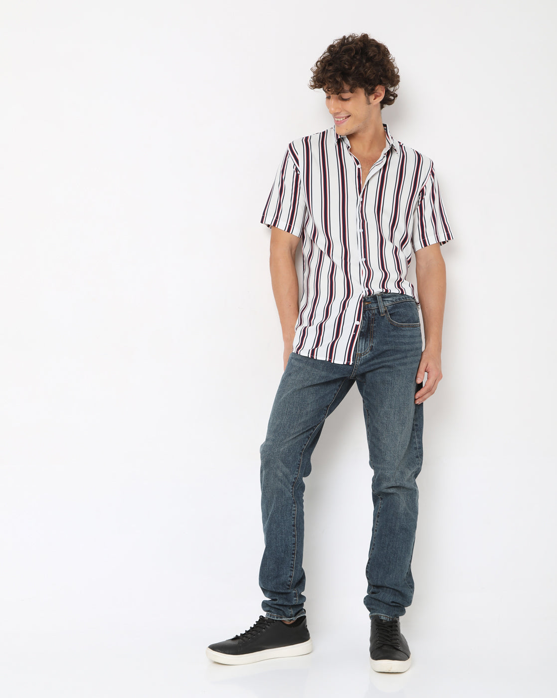 white shirt with red stripe on sleeve