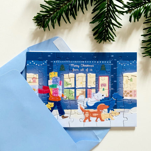 Piece & Love Puzzle Card "Merry Christmas from all of us" illustrata da Anna Micheloni
