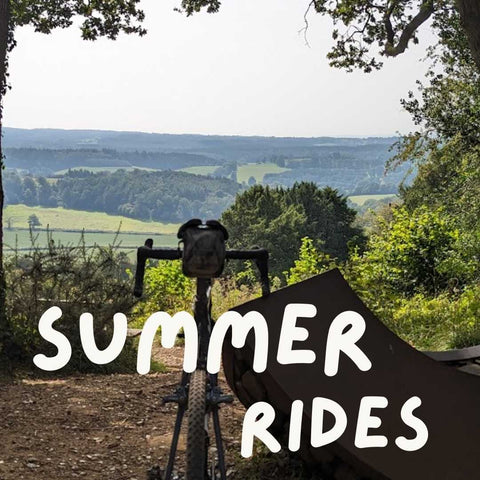 Gravel bike overlooking a green valley