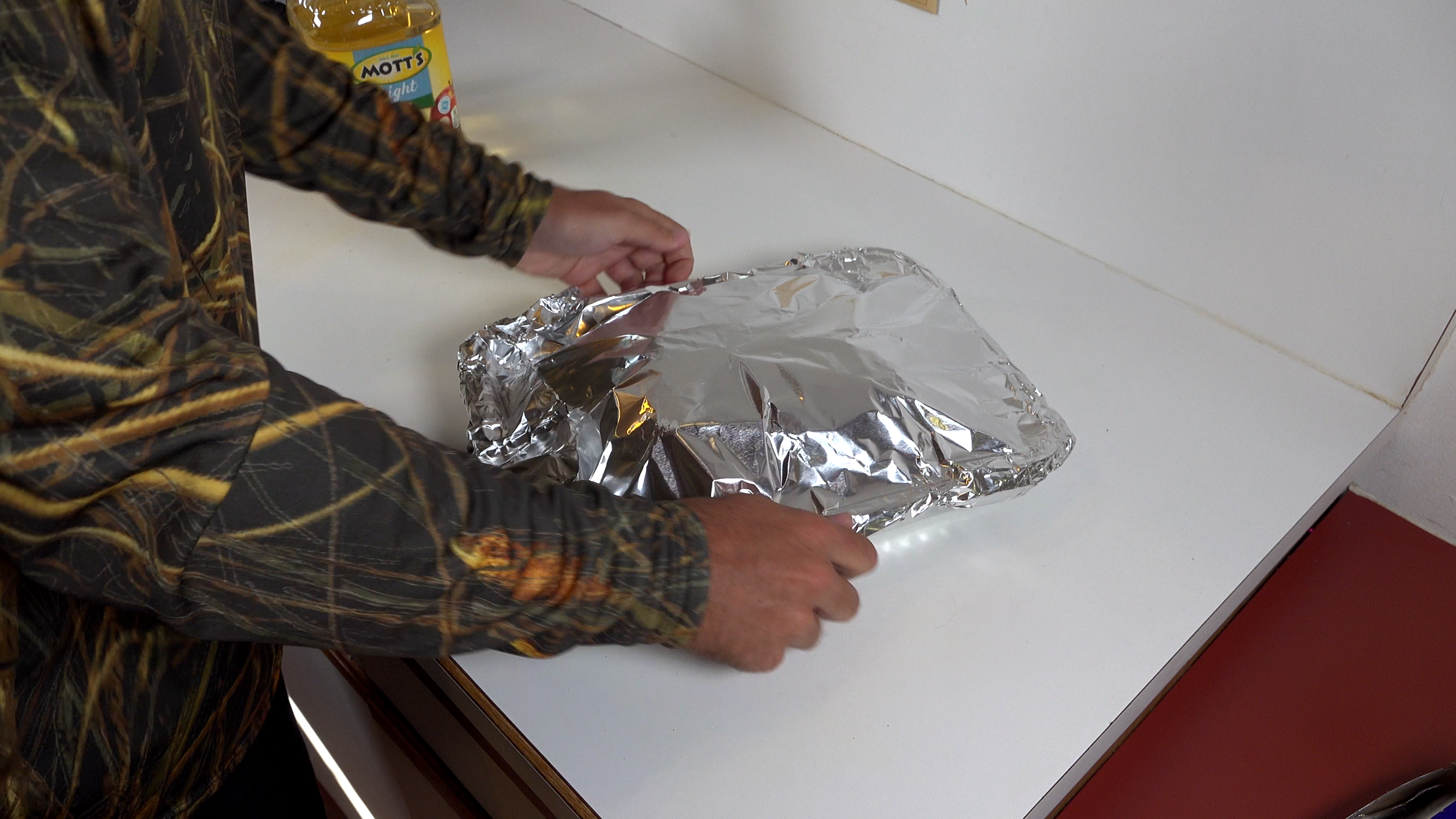 boston butt wrapped in foil for slow cooking