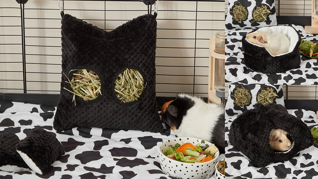 The Bold Black collection is perfect as Christmas presents for guinea pigs - even if they're shy. Pictured is a collage of guinea pigs in Bold Black accessories, sitting on the Cowprint fleece liner.