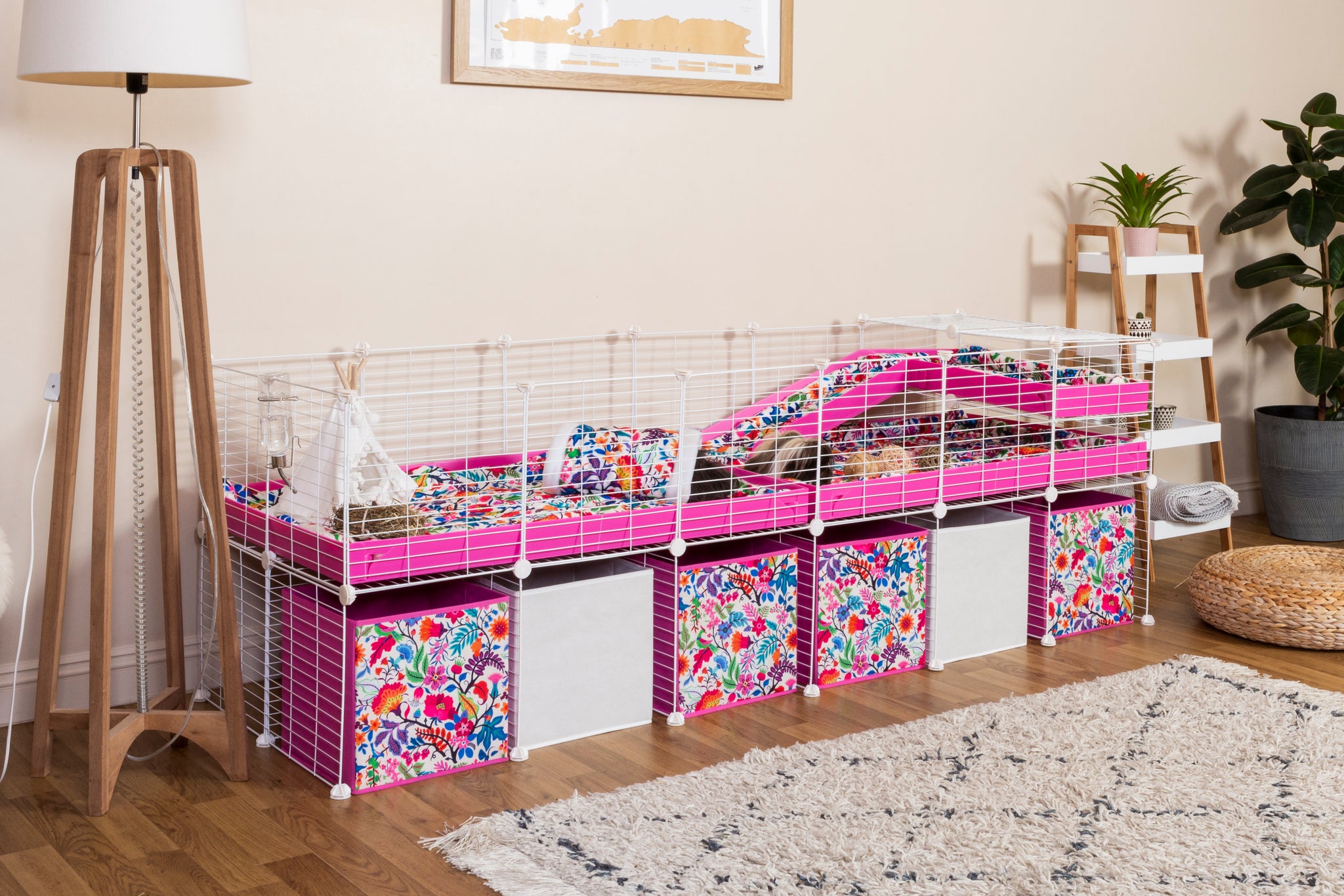 Pink and white grid kavee cage with storage underneath