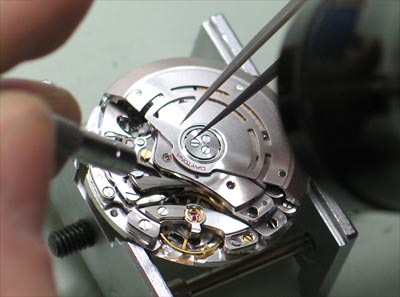 close up of a watch being repaired