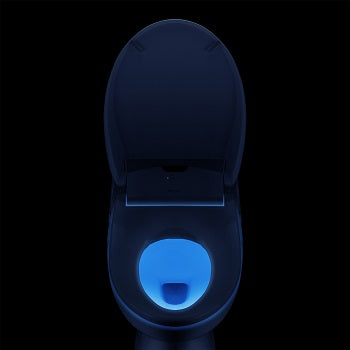 Swash 1400 front view in the dark with night light illuminating the toilet bowl