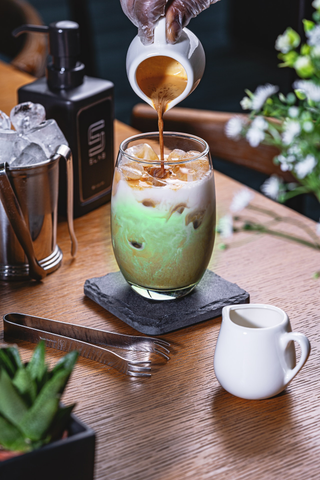 dirty matcha latte with rich and creamy bonsai cha matcha marbled with coffee and milk