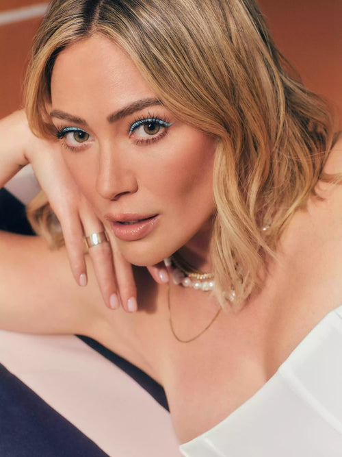 Hilary Duff posing wearing Bondeye Jewelry