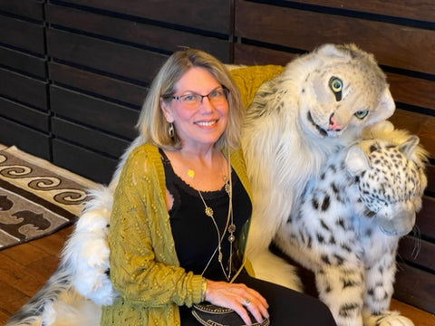 Woman with snow leopard