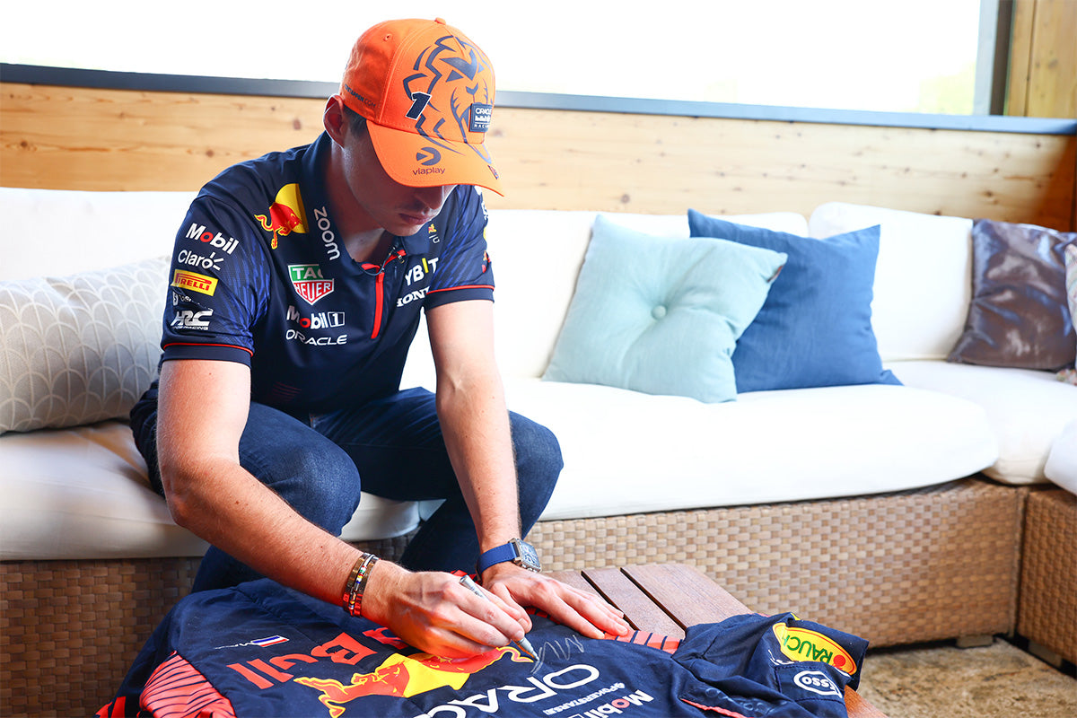 Max signing for charity auction