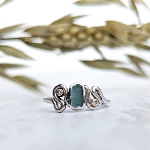 Teal sea glass ring with diamonds and gold