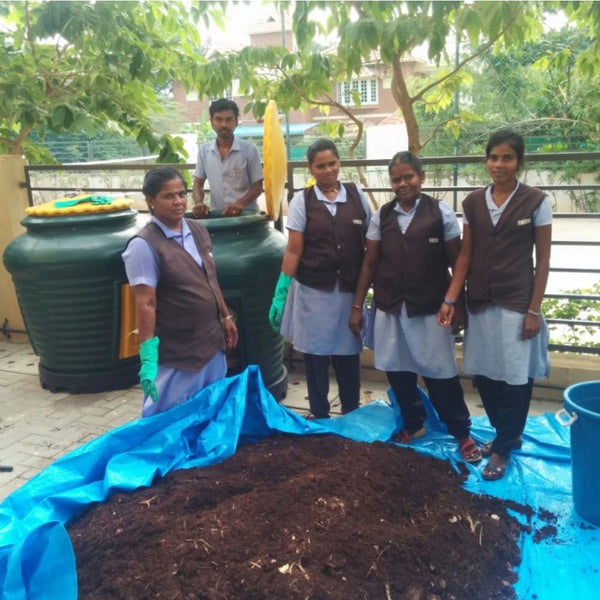 Daily Dump Aaga composter in community with housekeeping staff 