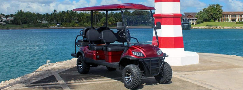 Casa De Campo Golf Car Rental - Red golf cart on a pier in the Marina in Casa De Campo