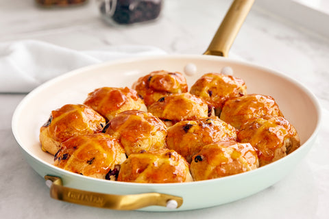 Skillet Hot Cross Buns made in a GreenPan Reserve Julep 12" Covered Frypan with Lid and sitting on a countertop.