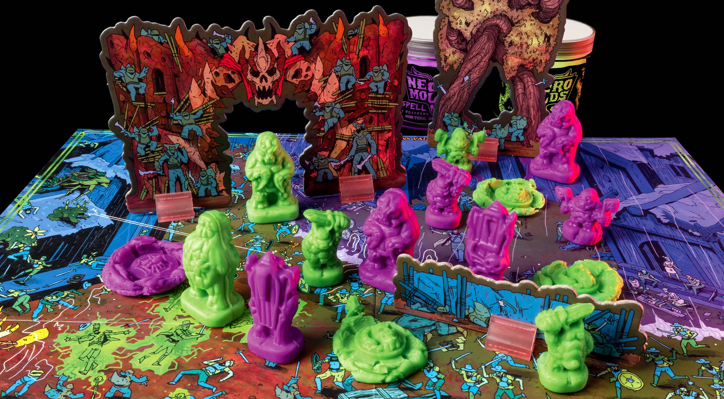 Play doh like clay miniatures being used in the two player family fun board game Necromolds. Some of the play doh monsters have been squished on the game board.