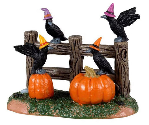 Appropriate for the season, this murder of crows is gathered near a pumpkin patch to discuss the hijinks they will get up to on Halloween night. Each crow wears a colorful witches cap to add to the festive fun and give these glossy black birds a slightly silly appearance. There are so many places in Spooky Town for this creepy quartet to roost you are sure to have fun trying them out here and there before finding the perfect spot.