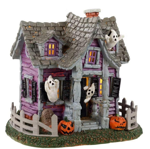 The Ghost House in Spooky Town is a delightfully creepy little house down by the river. Occupied by all the towns ghosts this ramshackle little house they call home has lots of windows for leaning out and yelling "boo"! Decorated with pumpkins for the holiday the Ghost House lights up inside for a clear view of all the ghastly ghosties.