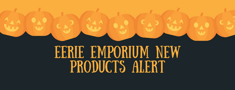 A black an orange banner has a line of various different jack o' lanterns running through the top center portion of it with the words EERIE EMPORIUM NEW PRODUCTS ALERT written beneath it.