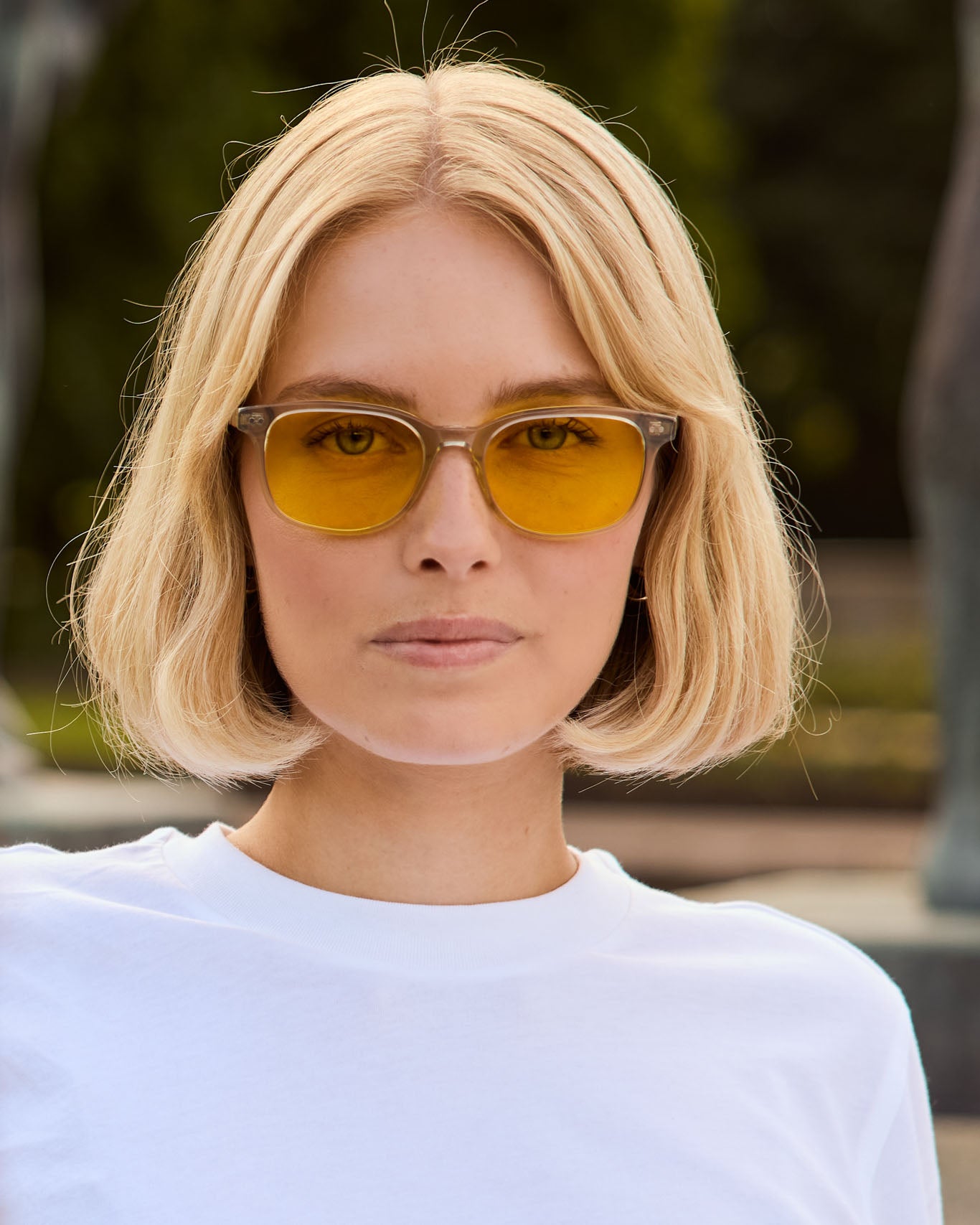 Model is wearing Filter Optix blue light blockers with Yellow lenses