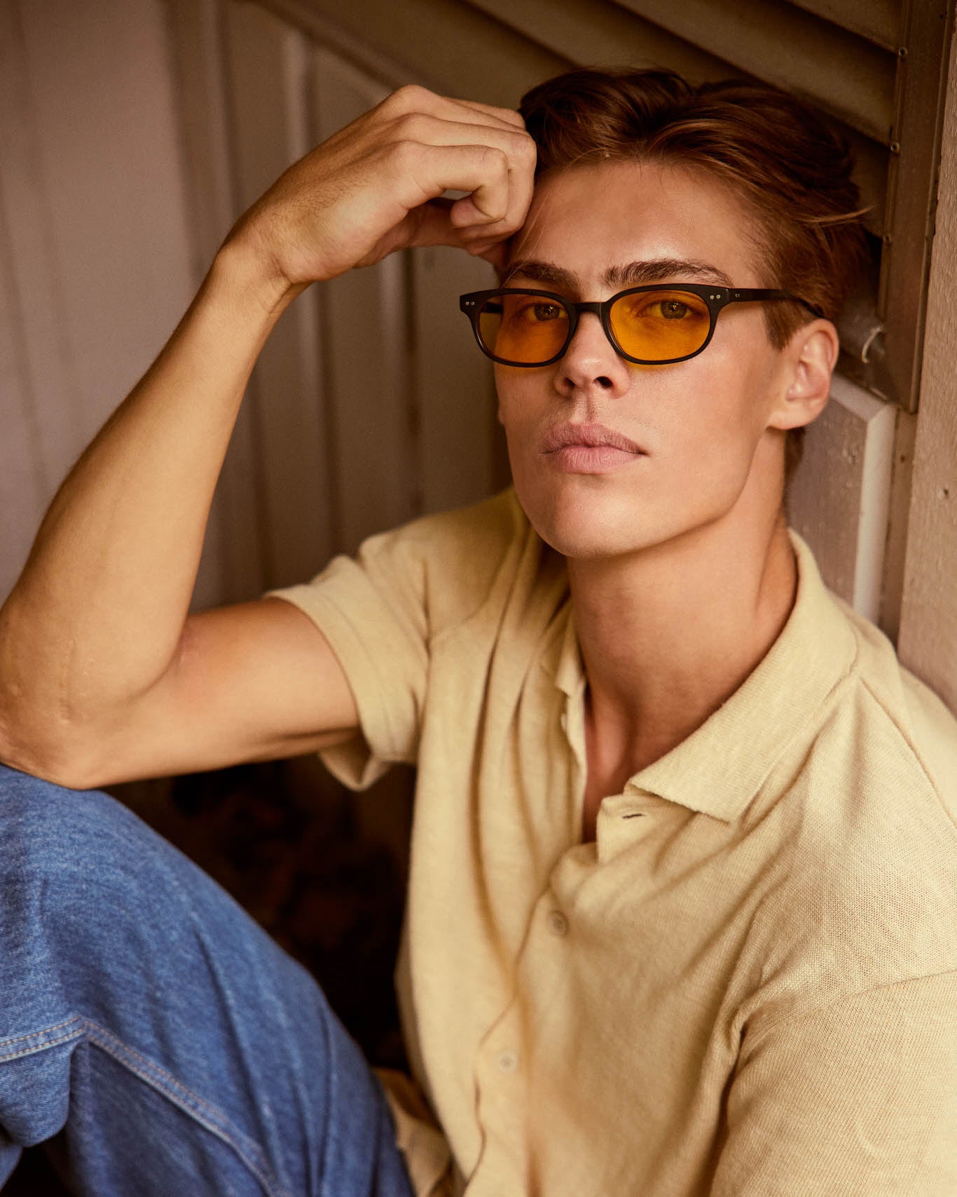 Model is wearing Filter Optix blue blocking glasses with Yellow lenses