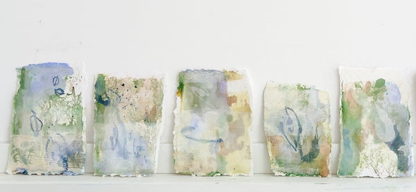 a row of delicate coloured abstract paintings on paper by artist Tara Leaver