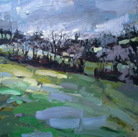 Abstract painting of a green field with purple and blue trees and sky behind it by Cornwall artist Jill Hudson at the Byre Gallery 