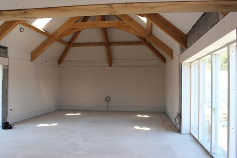 wooden beams in the ceiling of a newly constructed building 