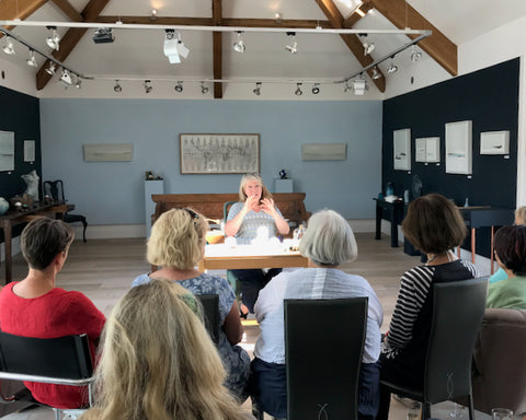 Loraine Rutt of the Little Globe Company giving a talk about her ceramic globes at the Byre Gallery in 2018