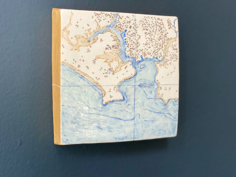 a ceramic map of Plymouth Sound and Rame Head in south west England made by Loraine Rutt of the Little Globe company 