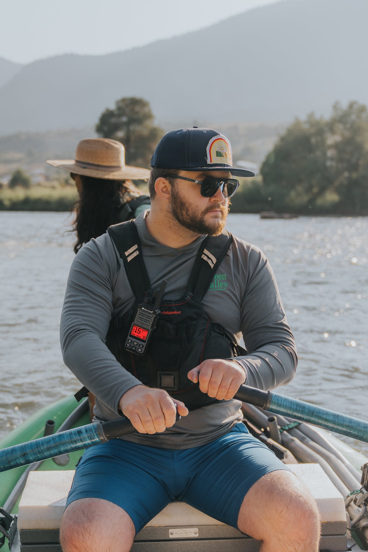 man on boat with walkie talkie