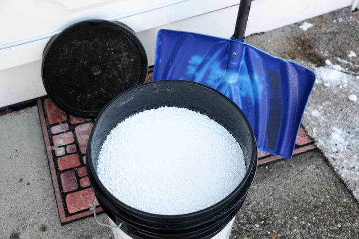 Snow shovel and salt to melt ice